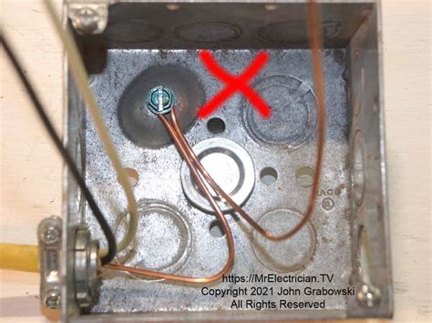 grounding outlets to metal box|ground wire touching metal box.